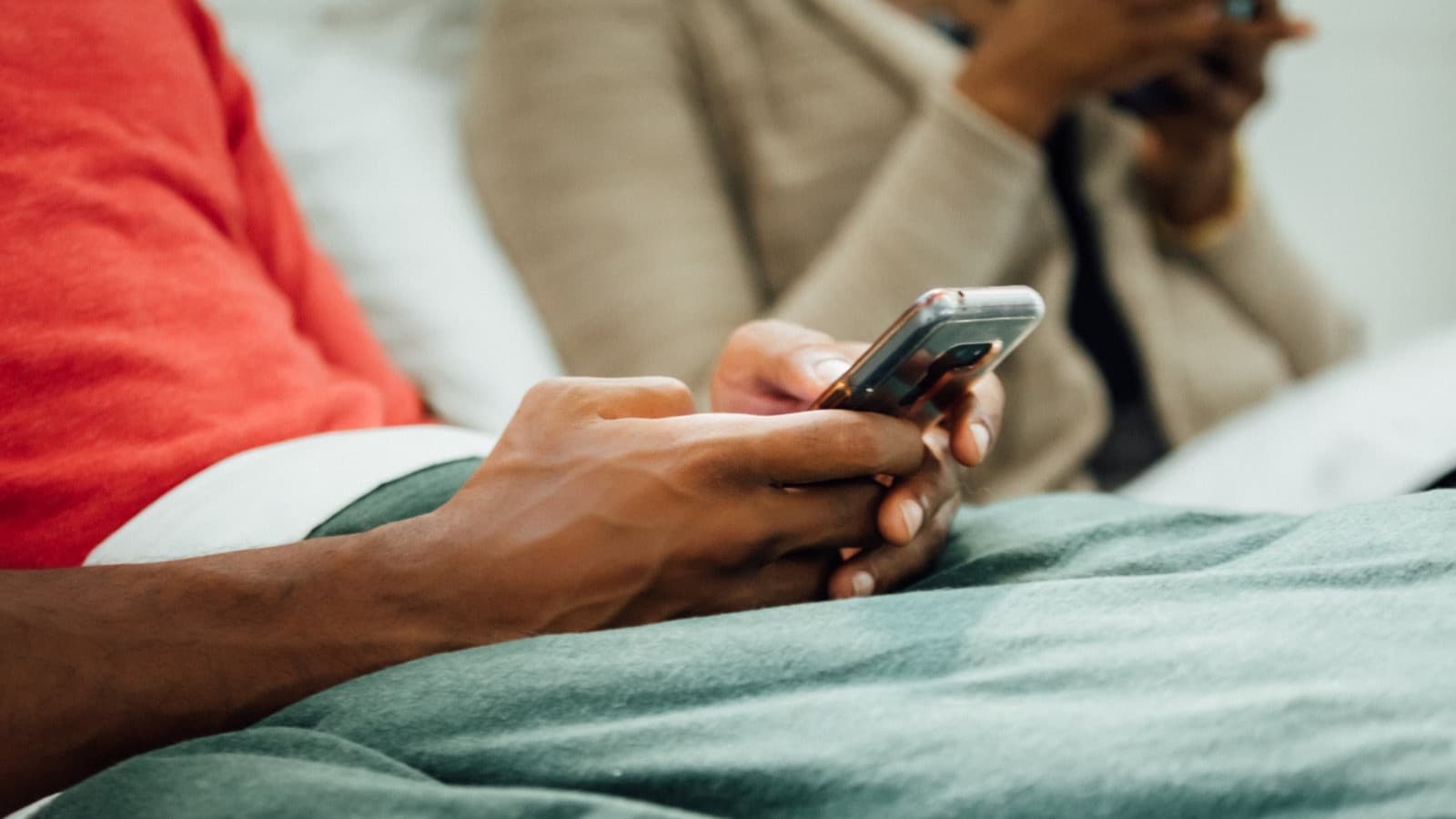 Moonlit bedroom scene with a phone turned face down and a calming checklist